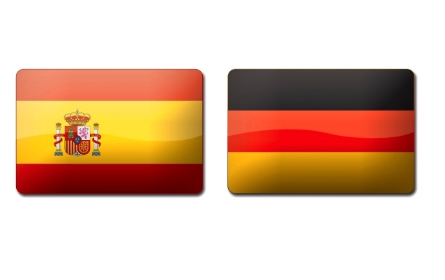 w prostokątach obok siebie są przedstawione flagi Hiszpanii i Niemiec