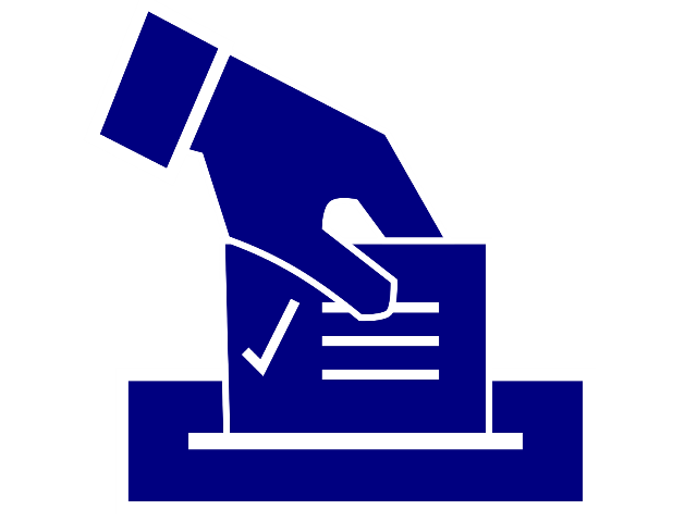 grafika z ręką wrzucającą kartę do głosowania do urny