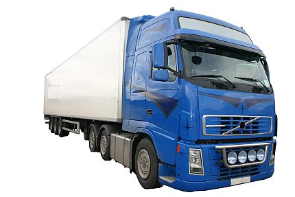 Duża niebieska ciężarówka z białą naczepą